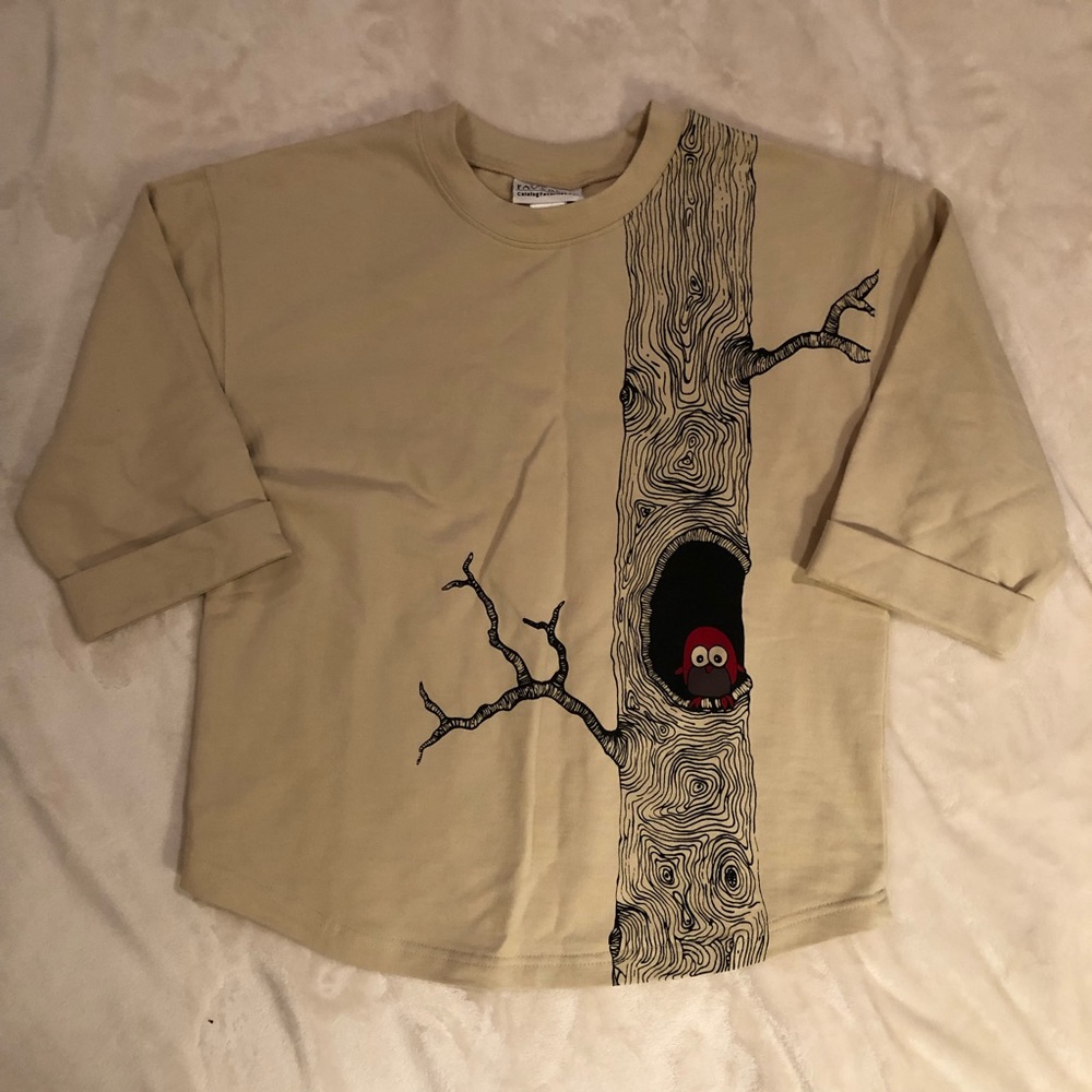 Top with an owl in a tree